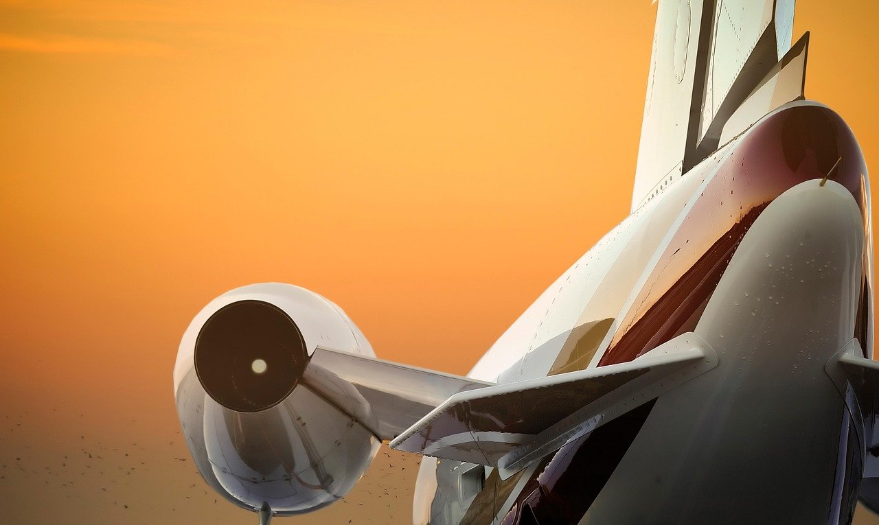 Jet engine against a sunset sky